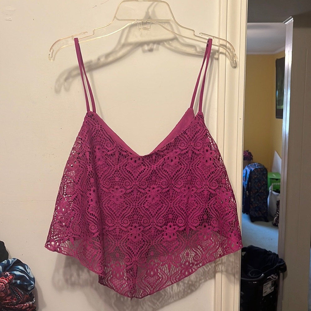 Charlotte Russe crop top with super cute design & bow on the back! Its a size M